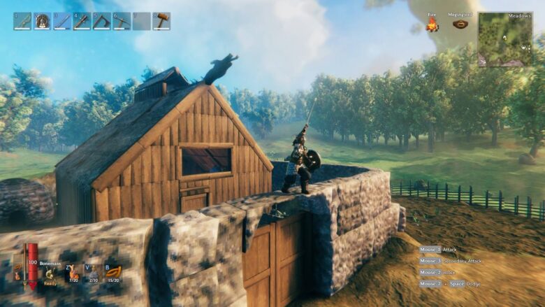 A Viking strikes a pose on top of their base
